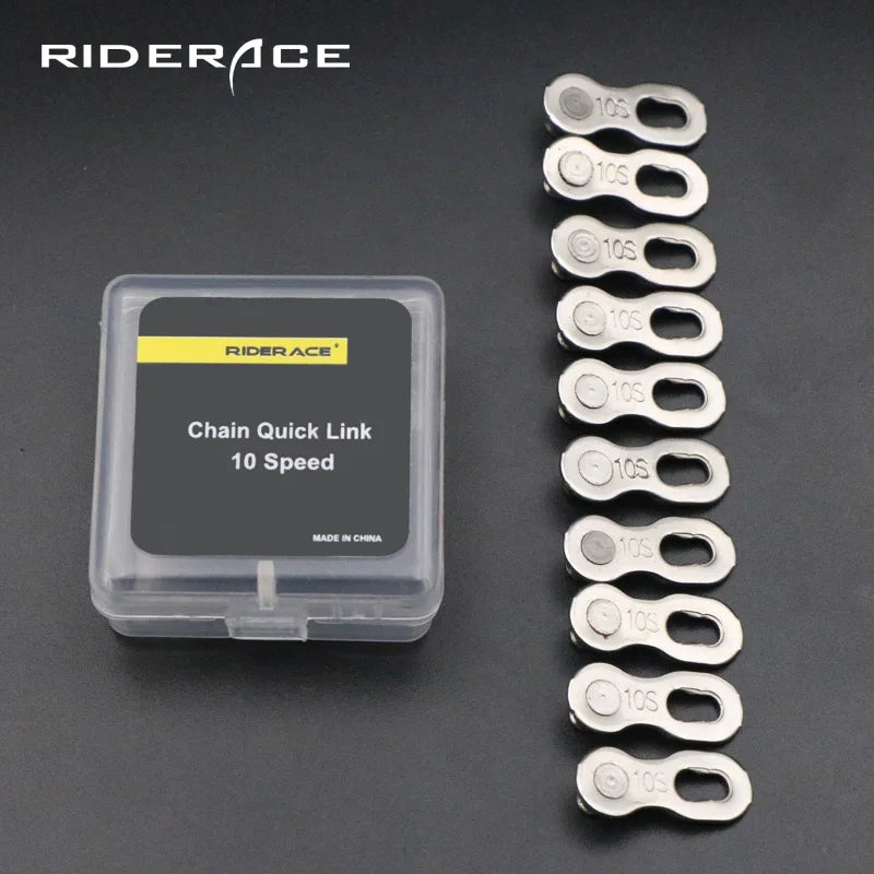 Silver bicycle chain master links arranged in connected strip