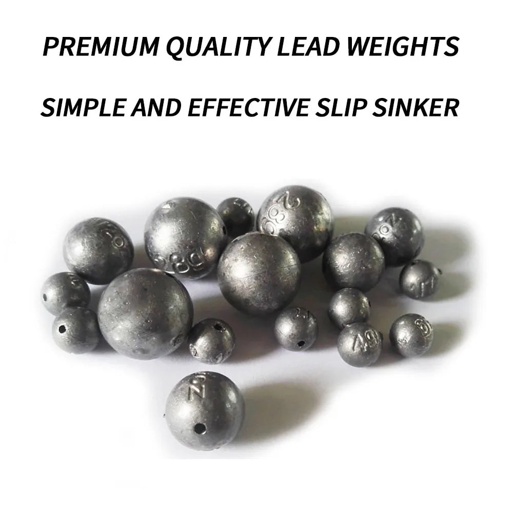 Close up of solid lead ball fishing sinkers in assorted sizes