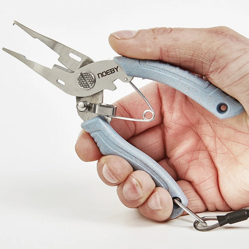 Split ring fishing pliers held in hand for lure rigging