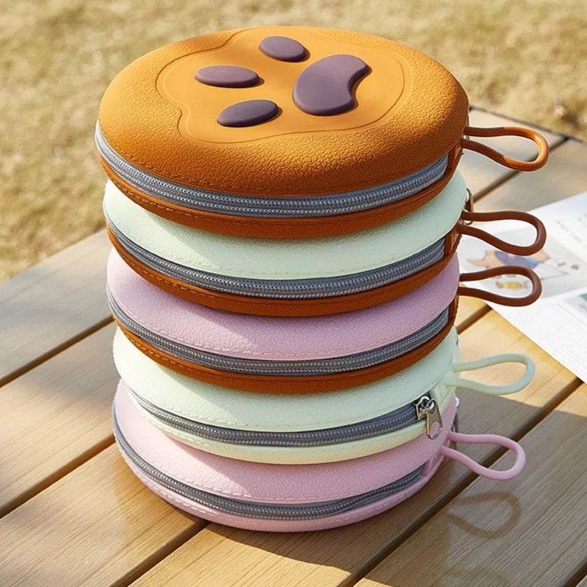 Stacked collapsible pet bowls showing colour options