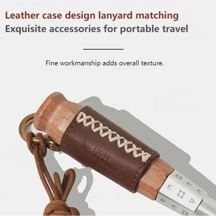 Telescopic fire blow tube with wooden handle detail