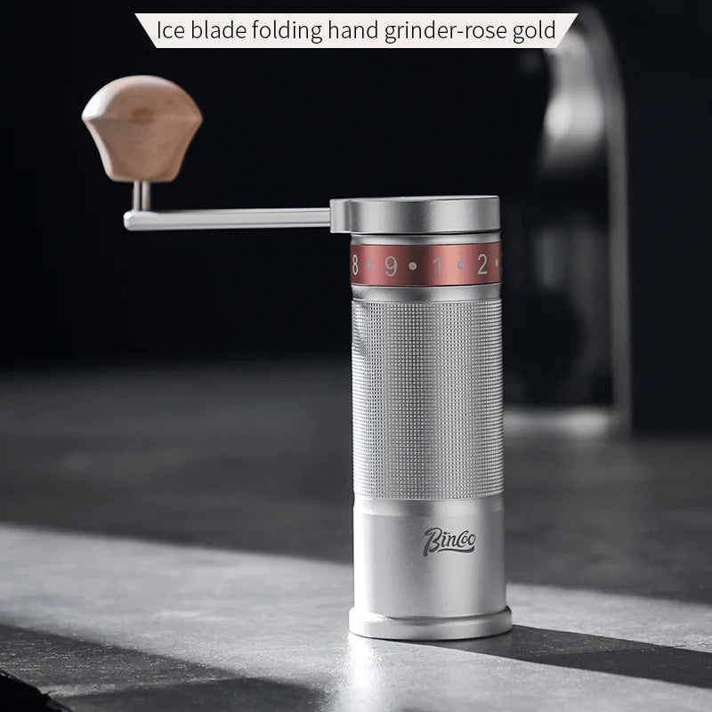 Silver folding coffee grinder with six-star stainless steel burr and smooth grind performance