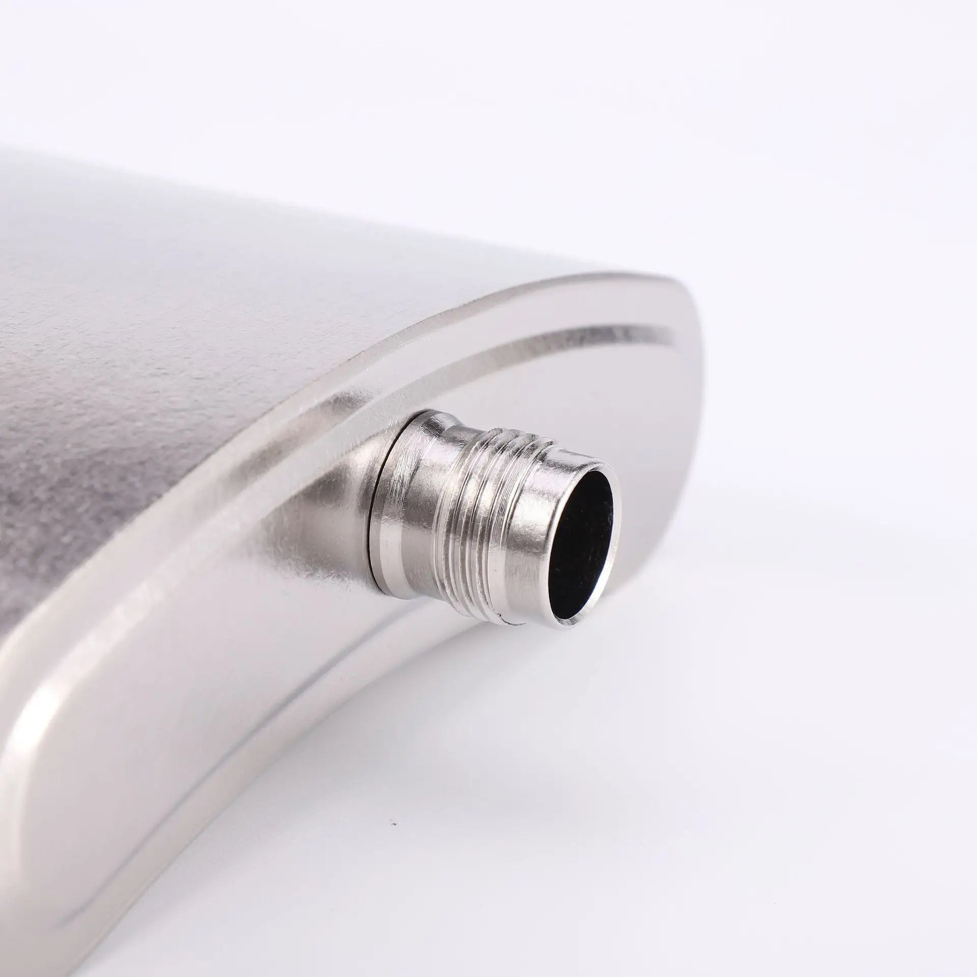 Close-up of threaded neck opening on titanium hip flask