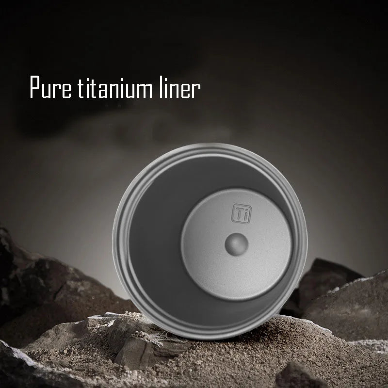 Close-up of titanium liner inside flask highlighting high-quality construction and stainless steel outer shell
