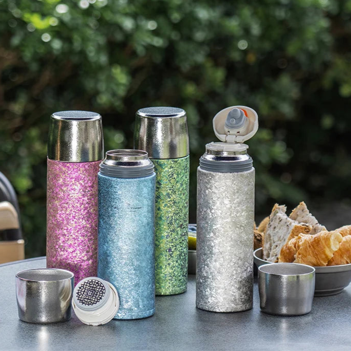 Titanium thermos bottles in multiple colour finishes