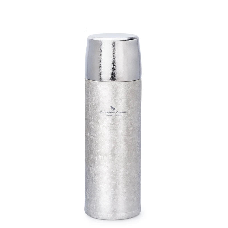 Titanium thermos upright front view