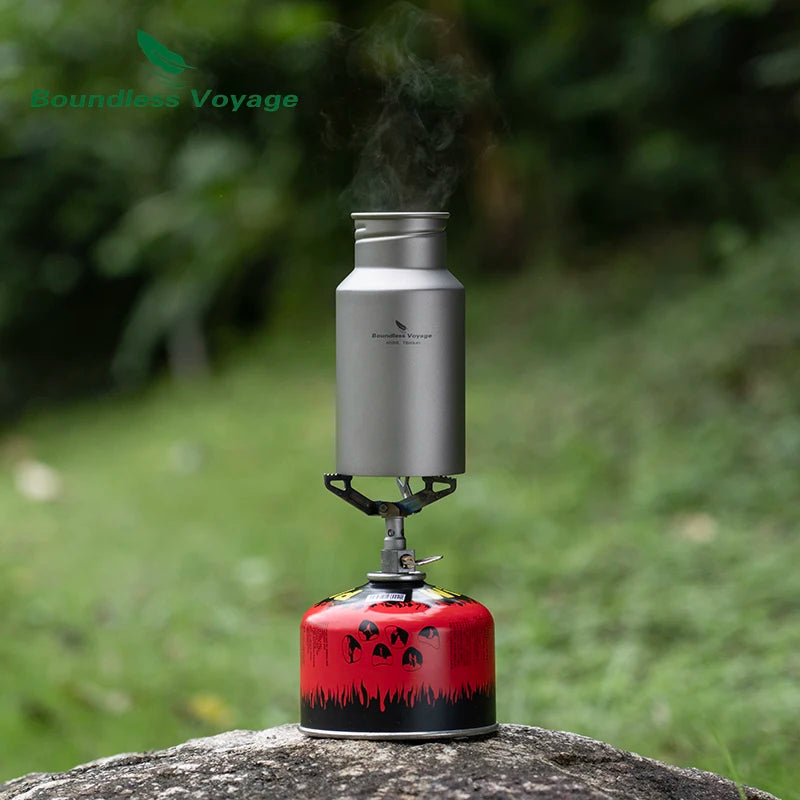 Titanium water bottle heating on small camp stove