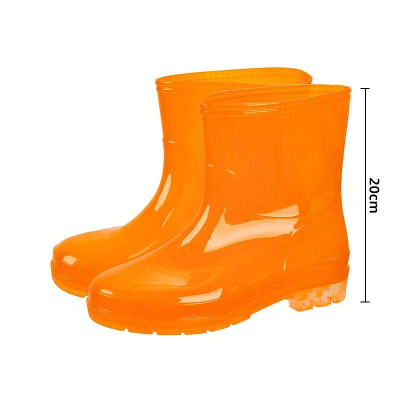Unisex orange mid calf gumboots pair shown from side angle