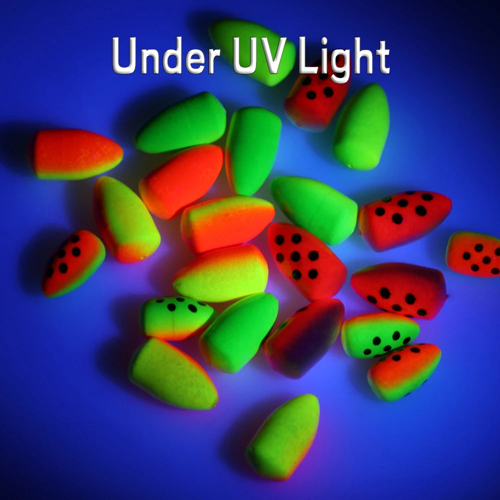 UV reactive fishing floats glowing under ultraviolet light