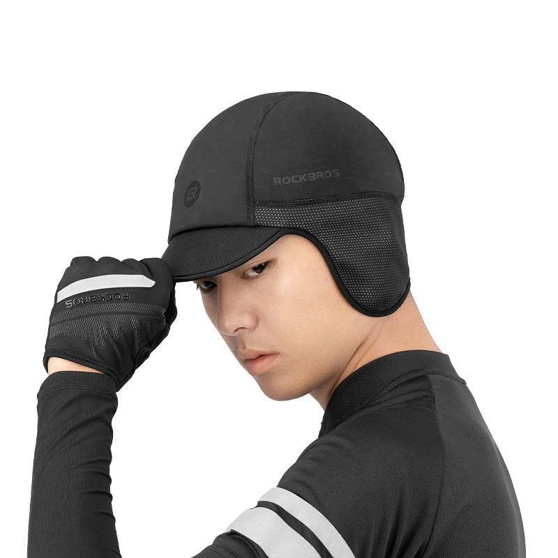 Winter cycling cap showing extended ear coverage side view