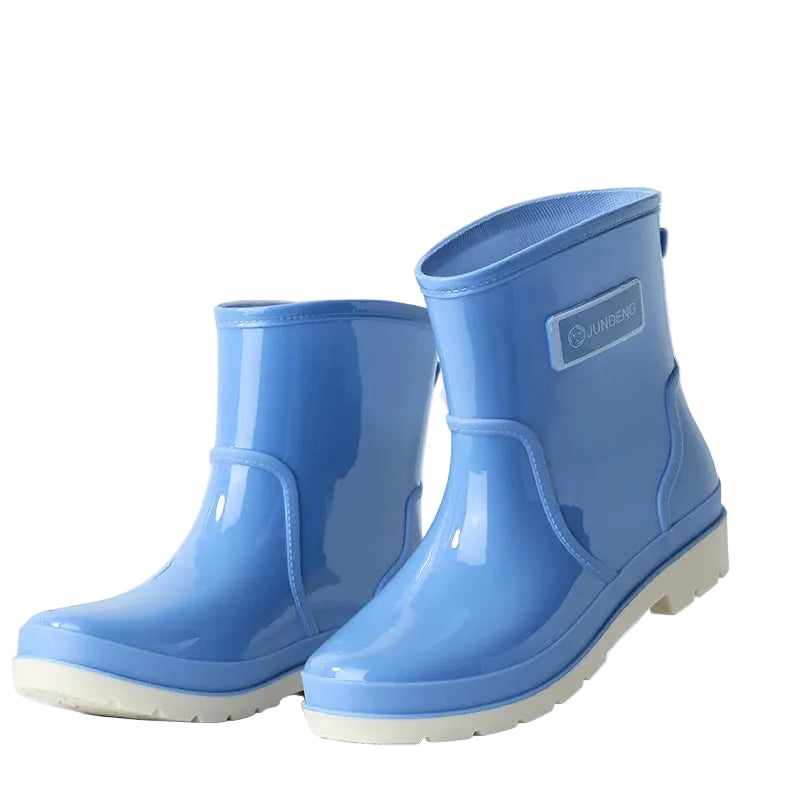 Blue women’s ankle gumboots pair angled to show sole and profile