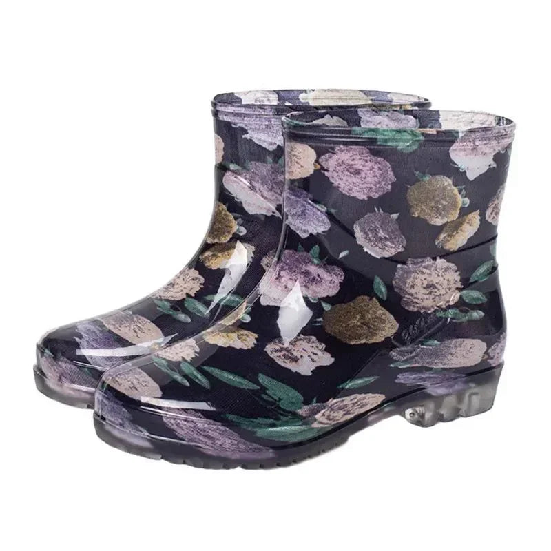Women’s ankle gumboots with floral print shown from side angle