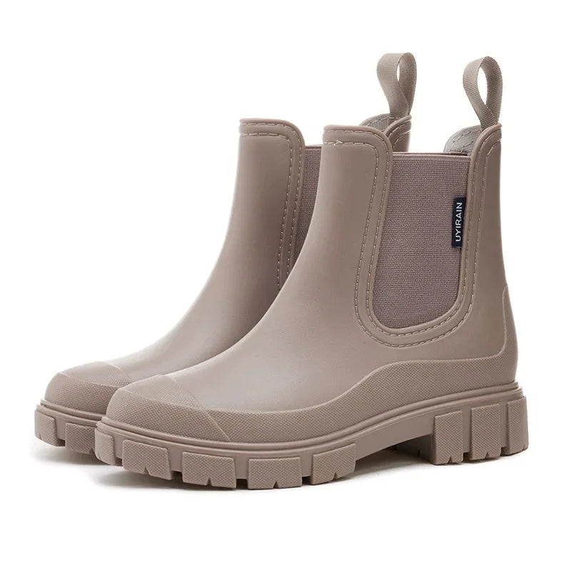 Women’s Chelsea ankle rain boots in brown with platform sole side view