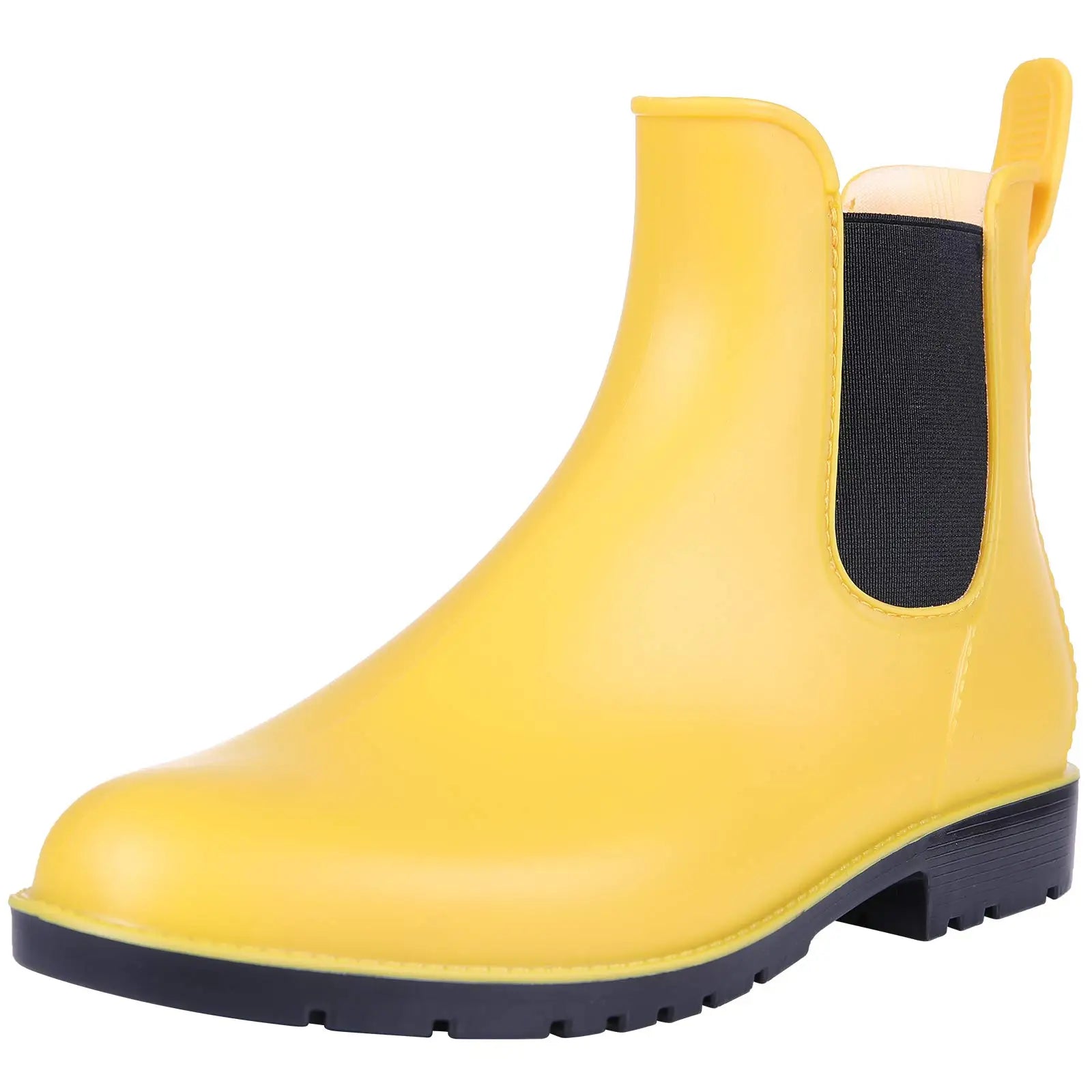 Women’s yellow Chelsea style ankle rain boots profile view