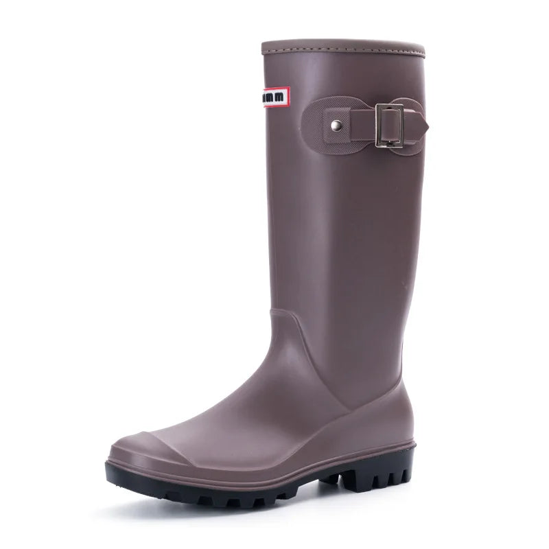 Brown women’s knee high gumboots side view with flat heel