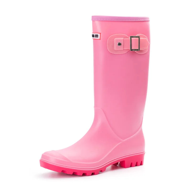 Pink women’s knee high gumboots side view with smooth finish